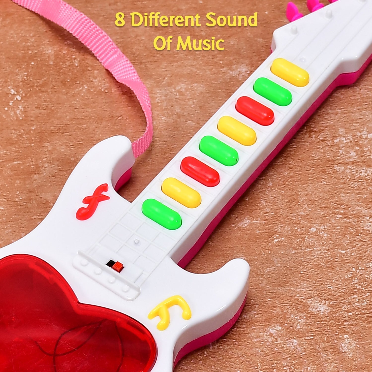 Light-up musical toy guitar for young kids. Light-up musical toy guitar for young kids.